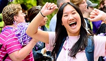 Female Northwestern student cheering 